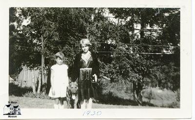 Isabelle Chesterfield with Young Boy and Family Dog