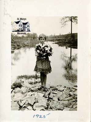 Young Isabelle Chesterfield Holding Bouquet Riverside