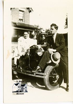 Bruce Chesterfield and His Aunt Maude Sitting on a Car