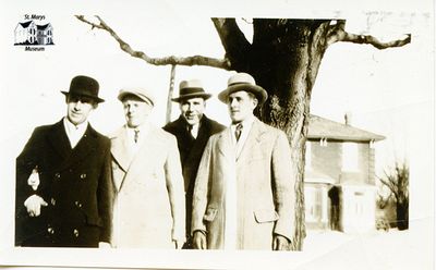 Bruce Chesterfield with Three Other Men