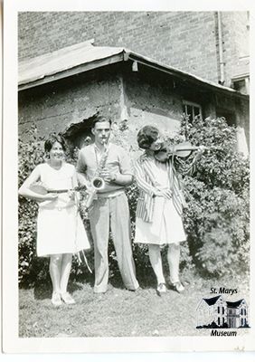 Three Chesterfield Siblings Playing Instruments