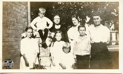 Chesterfield Family with Their Aunt and Unknown Woman Outside Family Home