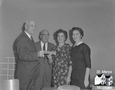 Hospital Auxiliary Receiving a Cheque