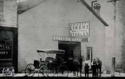 Milner's Livery Stables beside the Windsor Hotel, ca. 1900