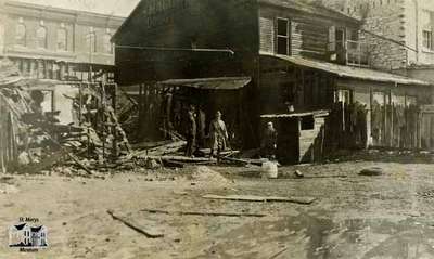 Aftermath of fire at Gregory Block (South side of Queen Street between Wellington and Water Street), 1921