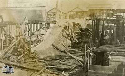 Aftermath of fire at Gregory Block (South side of Queen Street between Wellington and Water Streets), 1921