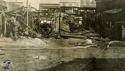 Aftermath of fire at Gregory Block (South side of Queen Street between Wellington and Water Streets), 1921