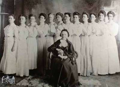 Mrs. James Whimster and 12 of her grand-daughters