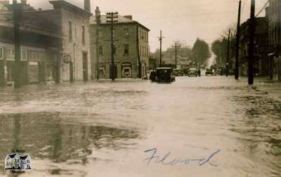 Queen Street looking west towards Water Street at the time of a flood, 1937