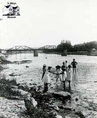 Group of children playing in the Thames