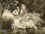 Mrs. Clench and Miss Elizabeth Cruttenden in the garden of the Clench house