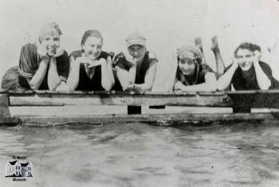 Five women in bathing suits