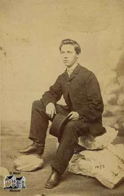 Young man seated