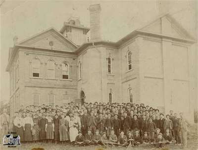 Class standing in front of school, 1893