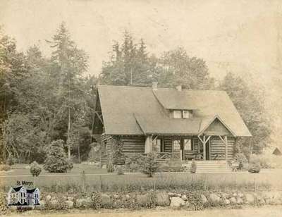 Log Cabin (landscaped house)