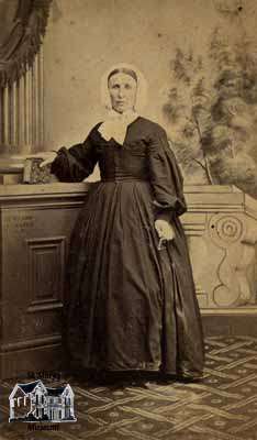 Woman standing with book