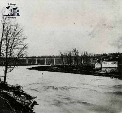 Sarnia Bridge, the Thames River and the Ashery as seen from the Victoria Bridge in 1865