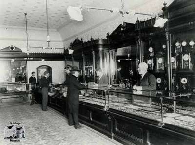 Interior of Andrews' store with electrical lighting