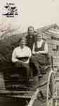 Mary and Jean White with their Aunt Nettie Fairbairn on a buggy