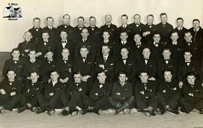 Group of men with uniforms that say &quot;Canada Bread&quot;