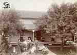 Family in front of house