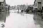 Water Street looking north to the bridge over Trout Creek during flood of 1937