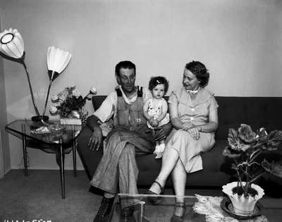 Unidentified Man and Woman With a Young Girl