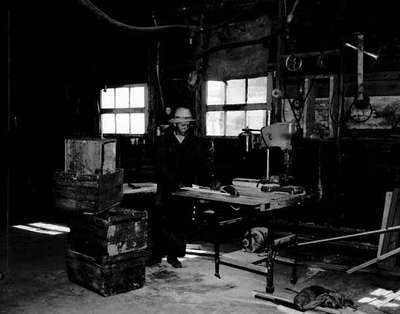 Unidentified Man Using a Circular Saw in a Workshop, St. Jerome, QC