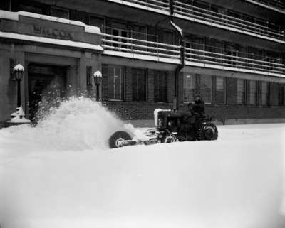 Clearing the snow at the Wilcox Pavilion of the Hamilton Mountain Sanatorium.