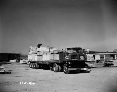 IHC Trucks Loading and Unloading at the Kingsway Lumber Co., Ltd.