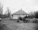Crank start tractor and wagon, Lawrence Brothers, Melfort, Saskatchewan.