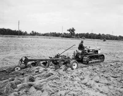 IHC  Crawler Tractor, model TD5 with an IHC, model no. 70, plough.