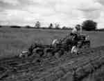 Ploughing with an IHC T-5 crawler tractor.