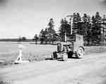 An IHC Farmall 100 tractor.