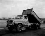 An IHC, model B174, dump truck belonging to Hamilton Builders Supply Ltd., Hamilton, Ontario.