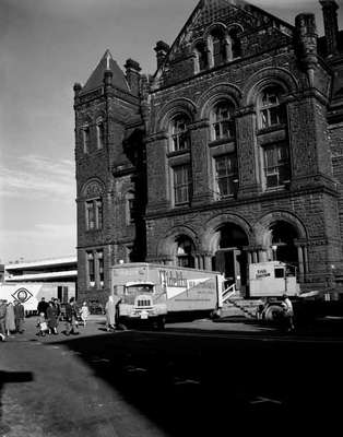 An IHC truck, owned by Fidelity Van and Storage Company Ltd., being used for the Hamilton City Hall big move.