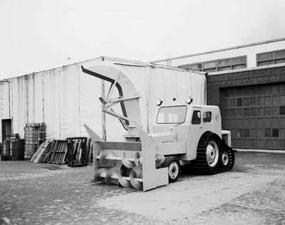 An IHC tractor with UD 282 tractor mounted snow throwers.