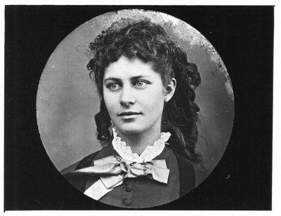 Portrait of a young woman with ringlets.