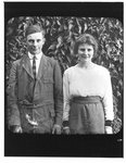 Outdoor portrait of young man and young woman.
