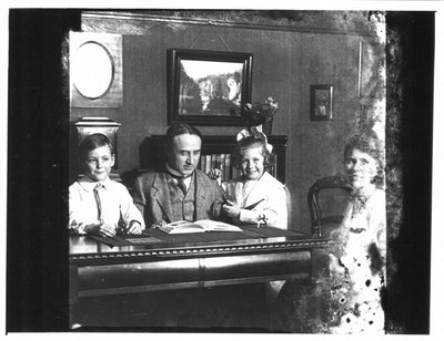 Family portrait around a table.