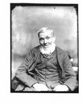 Portrait of a seated gentleman, with white beard.