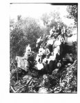 Outdoor group portrait on an Elora river bank.