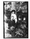 Informal outdoor portrait of John Connon and family.