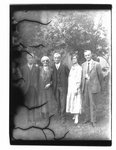 Outdoor group portrait of three men and two women.