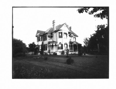 Large yellow brick house.