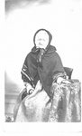 Portrait of an unidentified elderly woman, seated.