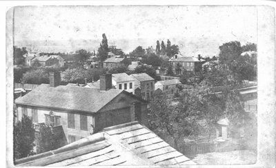 View of Port, with various frame and brick houses.