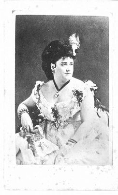 Portrait, 3/4 length, of an unidentified woman in evening wear.