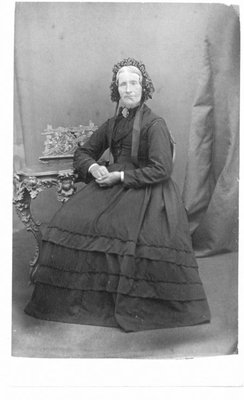 Portrait of Barbara Watt, seated.