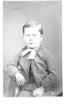 Portrait of an unidentified boy, seated.